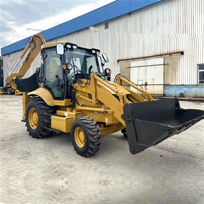 Utovarivač na kotačima s rovokopačem i hidrauličnim joystickom